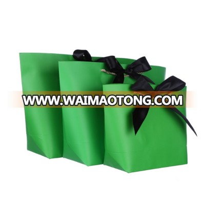 Promotional custom printed paper shopping gift bags with silk ribbon bow handle pink paper bags